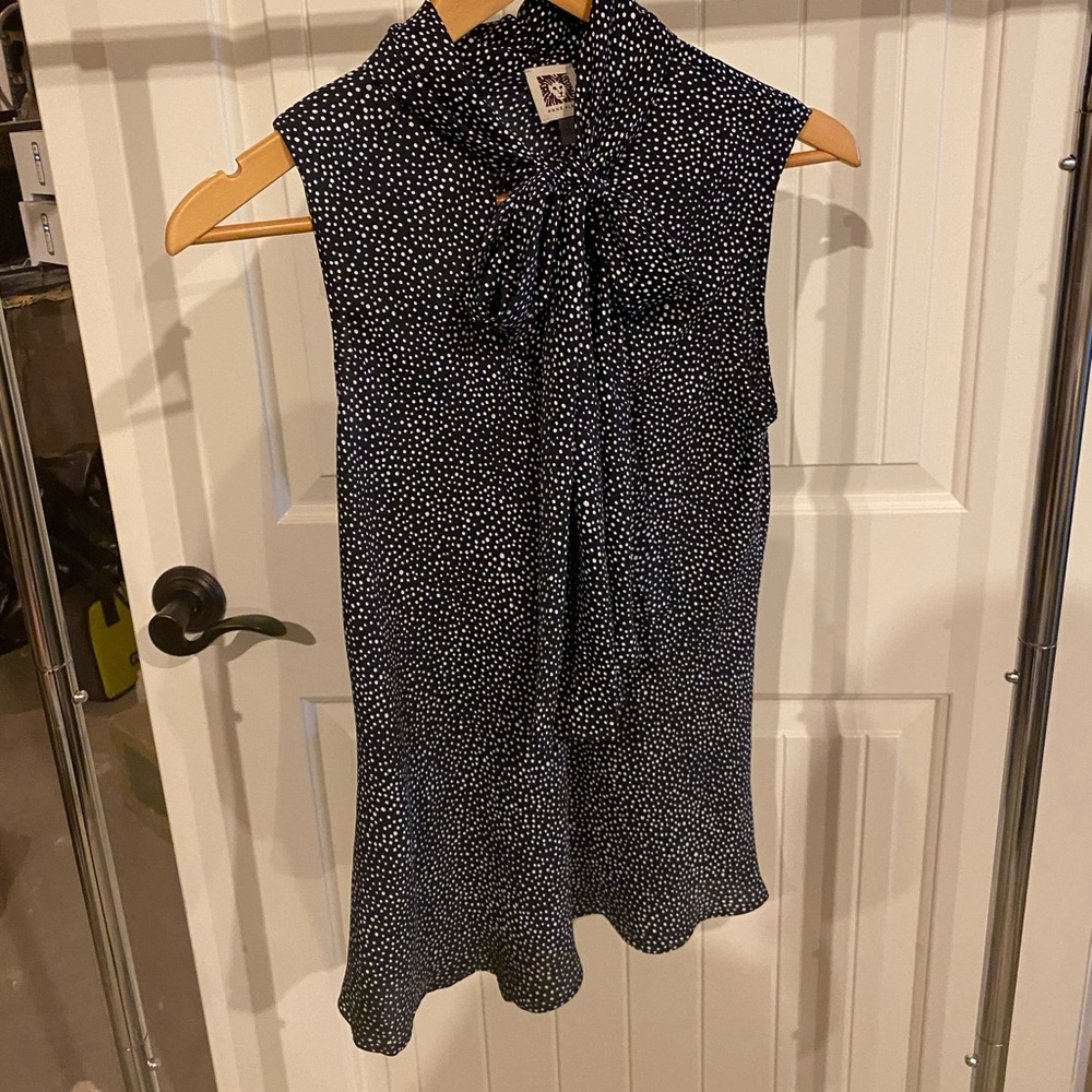 Navy and white polka dot top